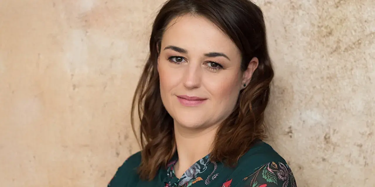 Uśmiechnięta prezenterka TVN24, znana z wielu programów. Jej nazwisko to Joanna Racewicz.