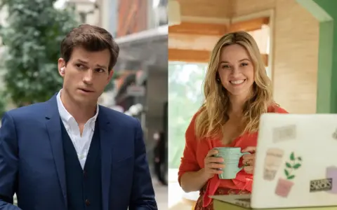 Ashton Kutcher w garniturze i Reese Witherspoon z kubkiem przy laptopie. Gwiazdor znany z wielu filmów, seriali i programów.